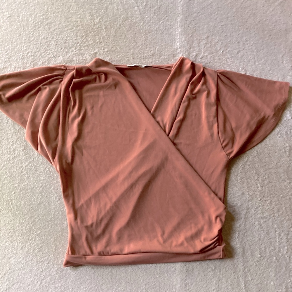 creamy pink top